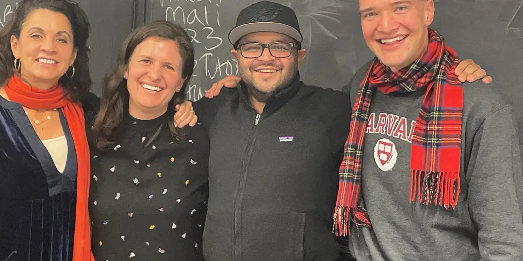 E-Lab teaching team standing in front of blackboard