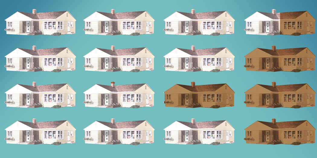 A pattern of illustrated houses - most in white and some in brown