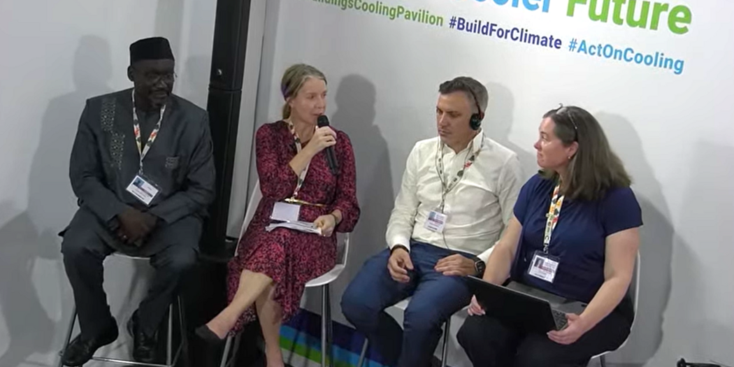 Event panelists speak with moderator