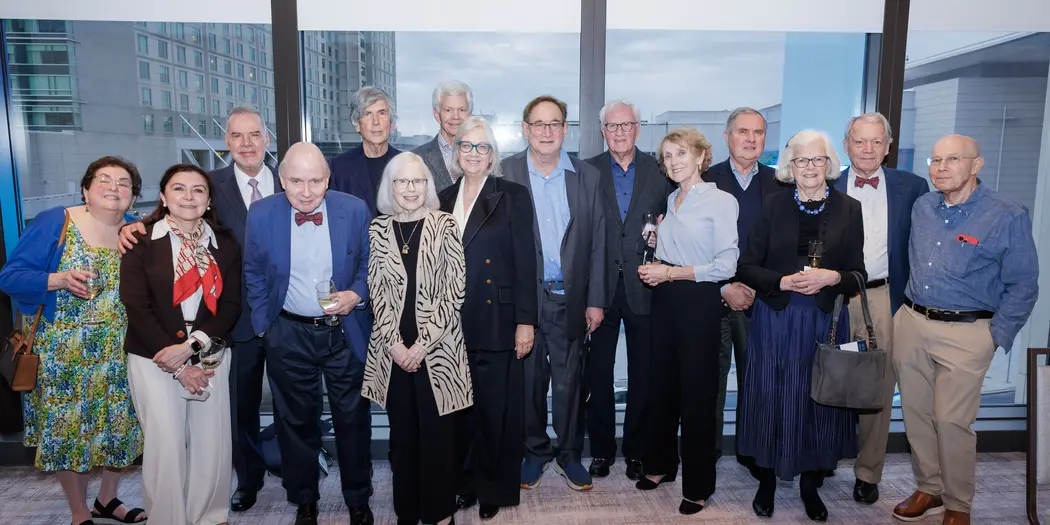 A group of MIT Sloan alumni pose for a photo during Reunion 2026