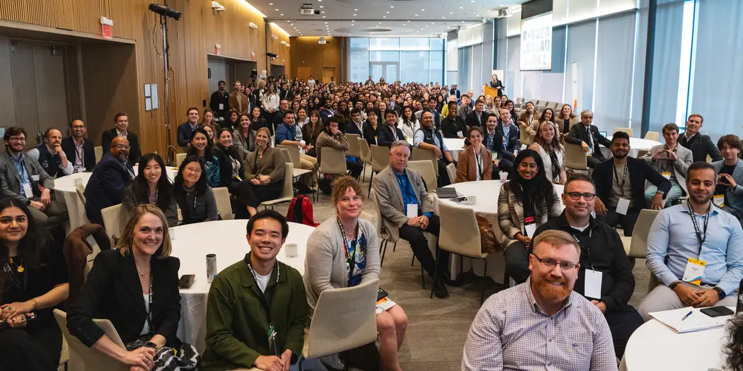 Attendees of ClimateCAP MBA Summit pose for a group photo at the Samberg Conference Center