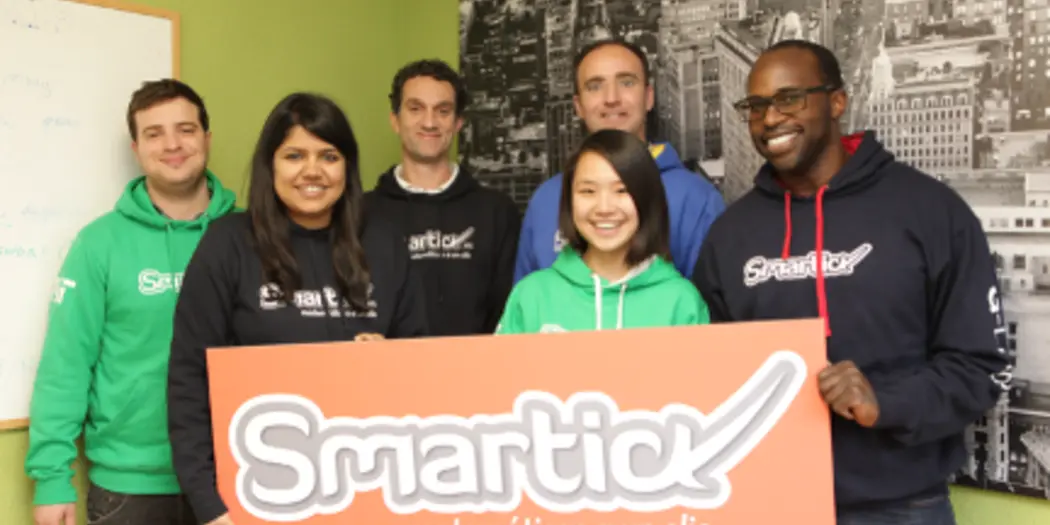 G-Lab students and host holding Smartick sign
