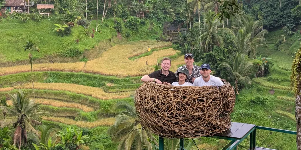 G-Lab Chickin Indonesia 25-26 team sitting in large man made nest