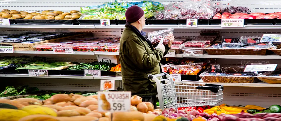 Person shopping in produce section of Daily Table