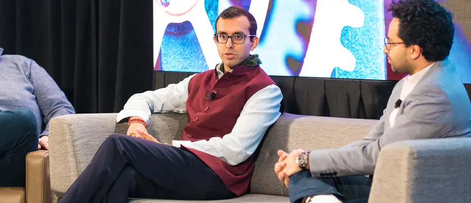 Krishna Gupta (center) founder of Romulus Capital, talks with ClearMotion CEO Shakeel Avadhany (right) during a panel at the MIT Venture Capital and Innovation Conference. Moderator is Ed Pease (left).