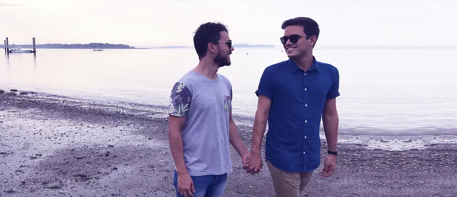 Couple holding hands on a beach