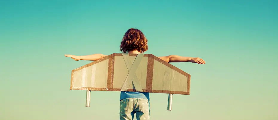 Child flies homemade cardboard plane