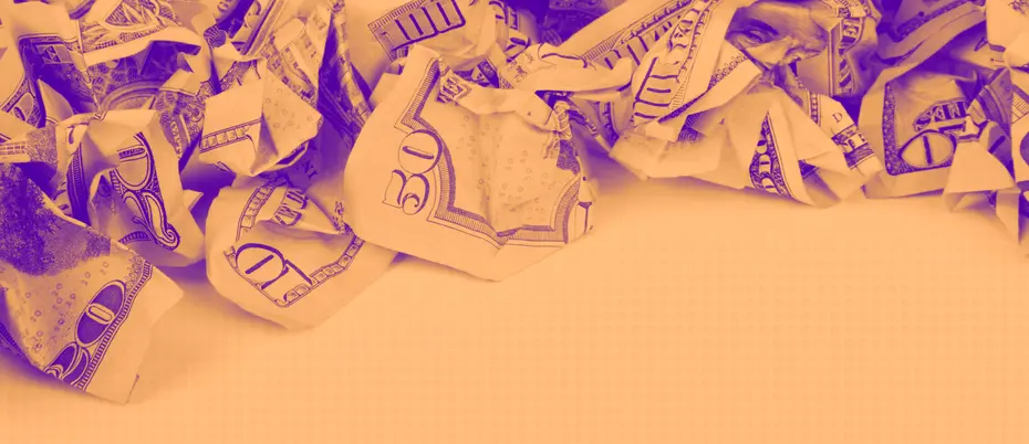 Crumbled up US currency bills