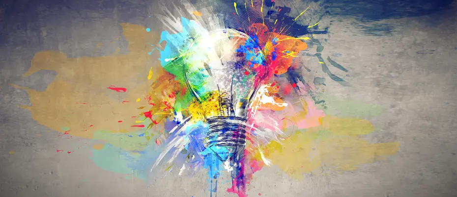 Lightbulb surrounded by bursts of color