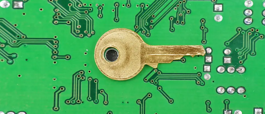 key on top of an early circuit board