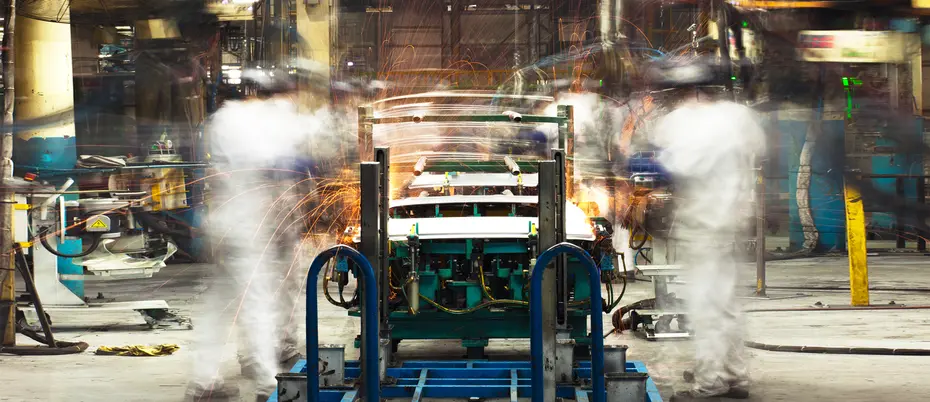 Two workers on an assembly line.