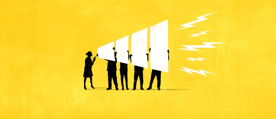 four workers hoisting a giant megaphone 