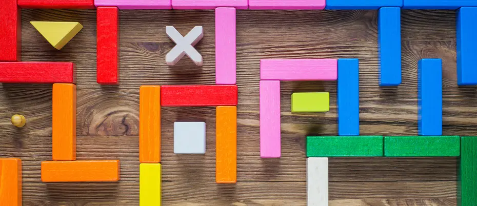An illustration of a maze created out of building blocks from a child's playset.