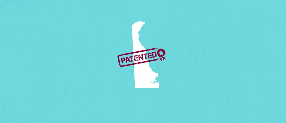 outline of the state of delaware with a patent stamp