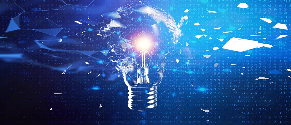 clear lightbulb exploding against a blue background