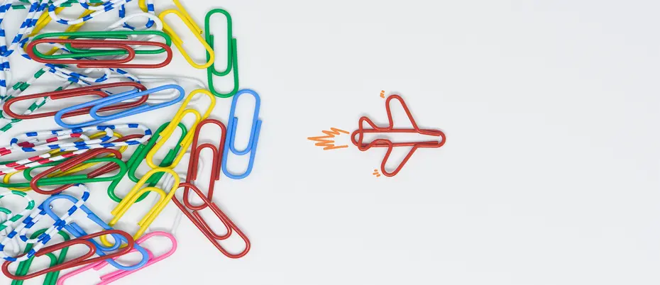 Paperclip transforms into airplane. 