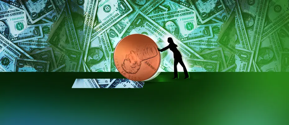a woman pushes a large penny in front of a background of dollar bills