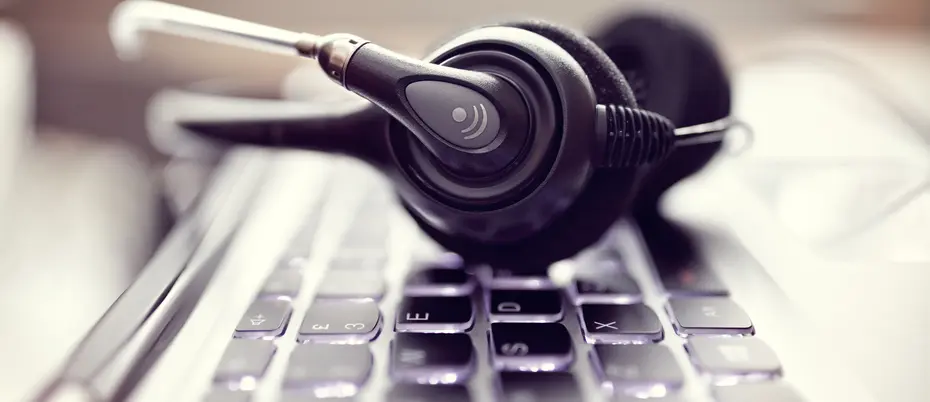 headphone set laying on keyboard