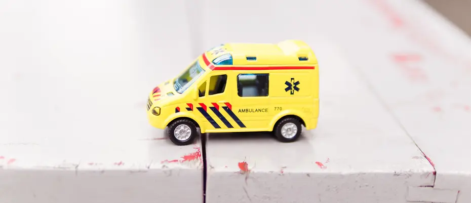 yellow toy ambulance