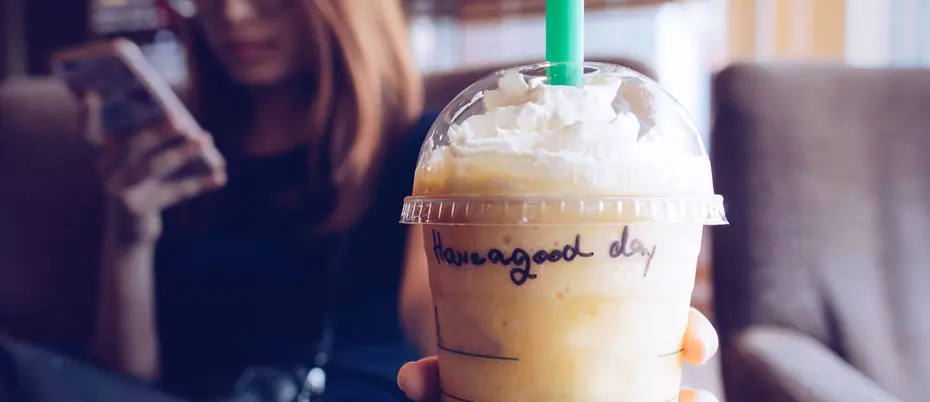 Picture of an iced coffee beverage with "have a good day" written on it.