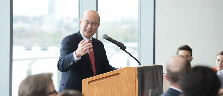 MIT Sloan Professor Andrew Lo speaking in front of an audience.