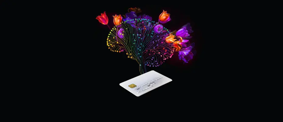 An illustration of a credit card with a brain above it with colorful flowers blooming out of the brain.