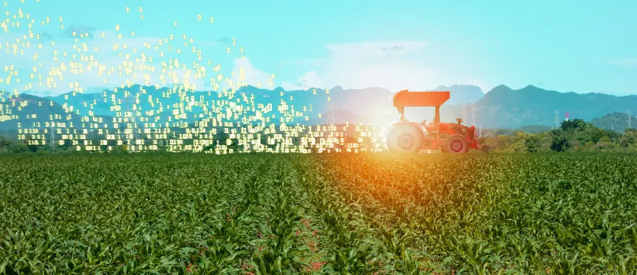 A photo illustration of a smart tractor with binary code coming out of it
