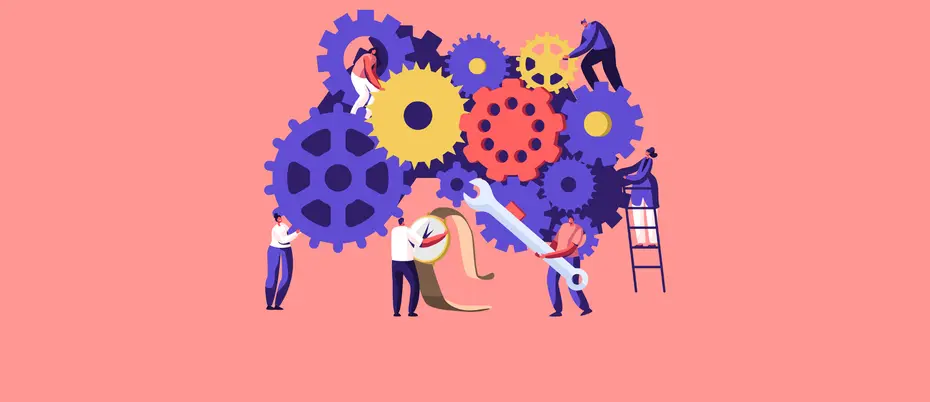 Two people tinkering with oversized gears