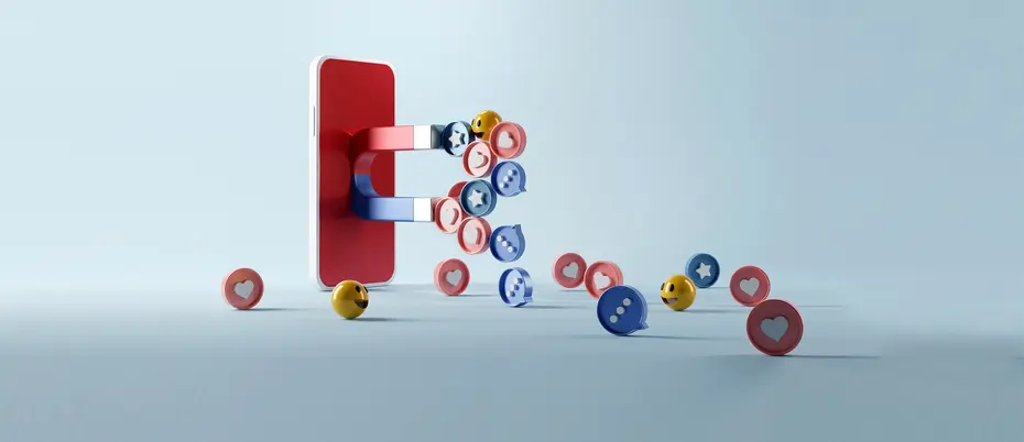 A magnet on a cell phone attracting various social media icons