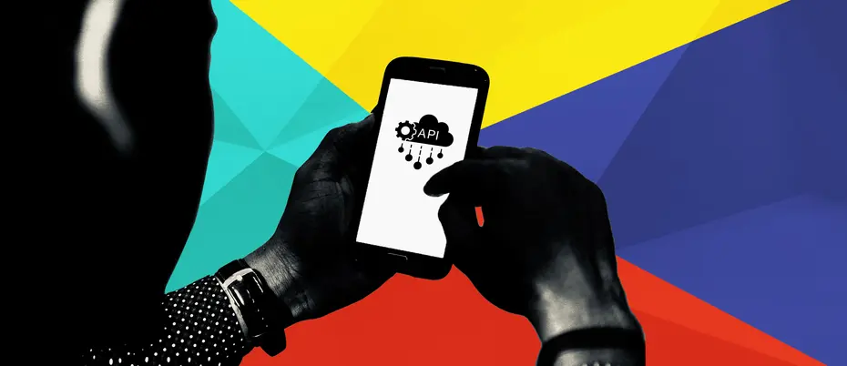 Person holding a phone with the API symbol on the screen