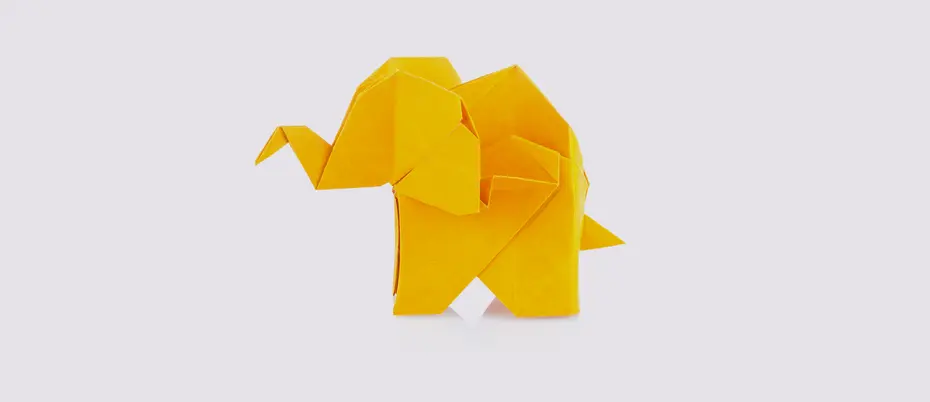 A yellow origami elephant