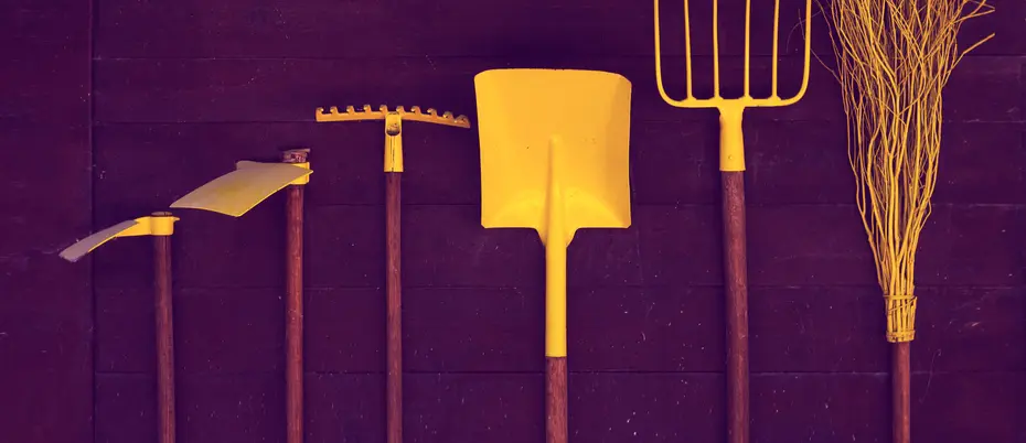 Garden tools arranged in a row