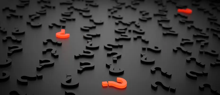 Orange question marks on black background