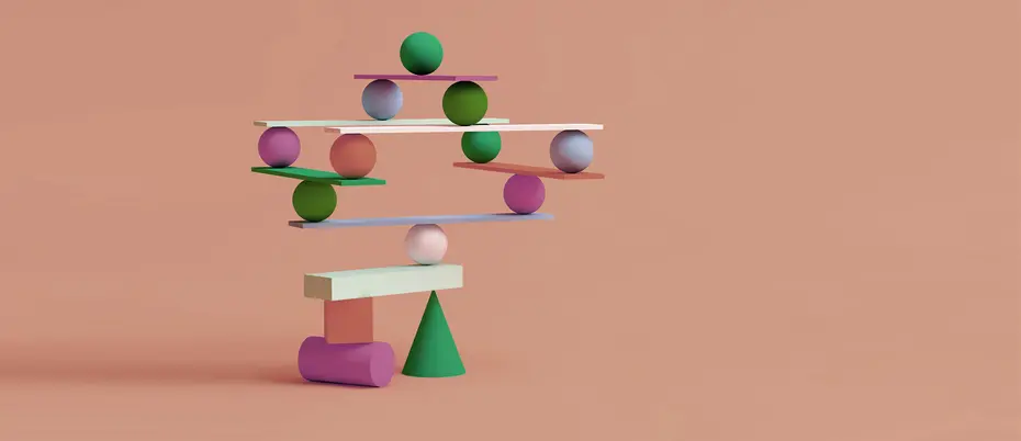 Geometric shapes balancing on one another dangerously