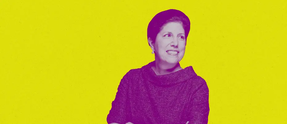 Linda Vahdat stands with her arms crossed and looks off to the side. The words "The Bias Cut" are overlayed on her right shoulder.