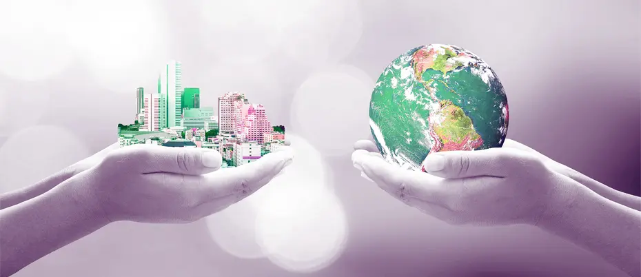 One hand holds a city and the other hand holds a globe