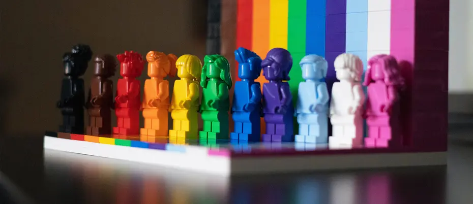 Diverse set of Lego people using rainbow colors
