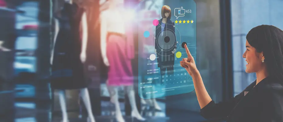 A shopper uses a smart technology screen in a retail store to choose, buy clothes, and give product rating