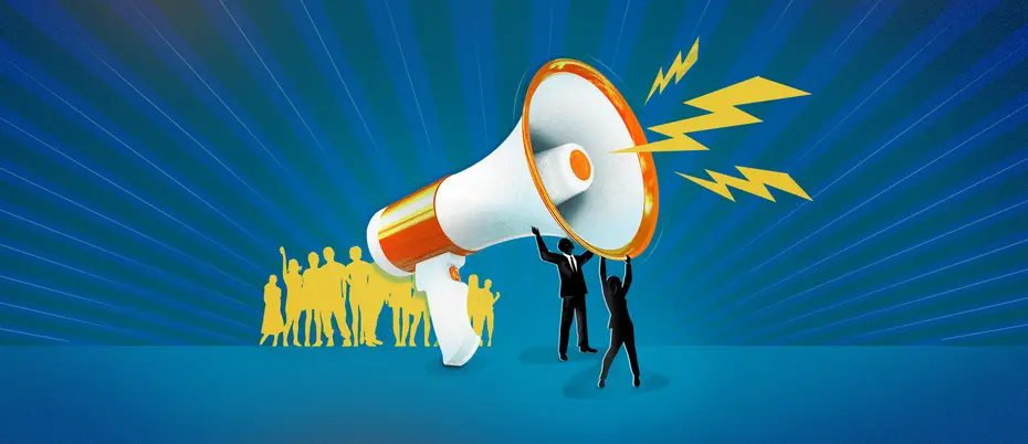 Two managers are lifting up a megaphone with a crowd of workers behind it