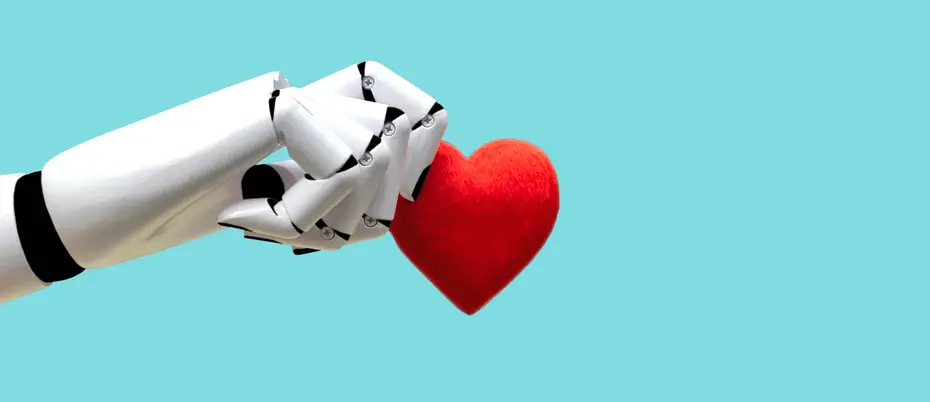 A robot hand holds a heart