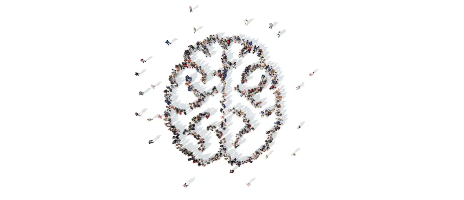 Image of a group of people arranged into the shape of a brain