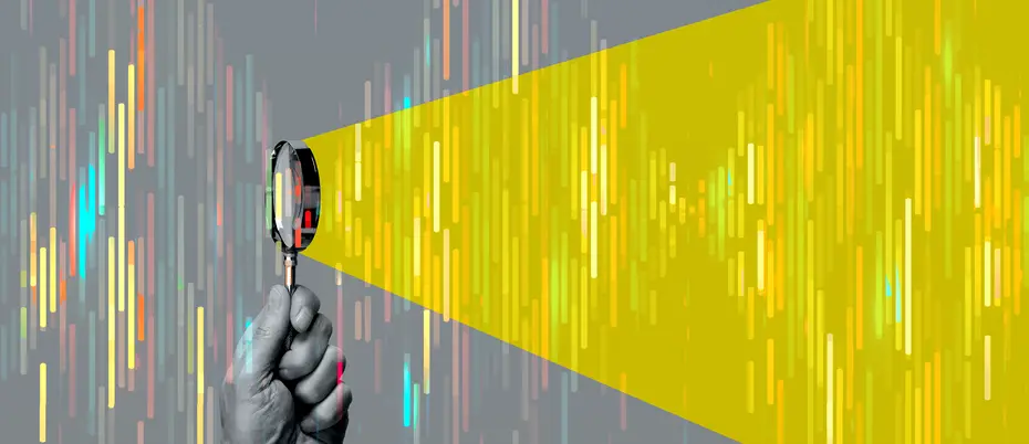 A magnifying glass looking through data 