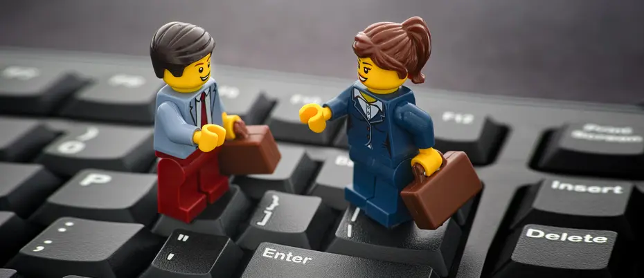 Lego business people on top of a keyboard