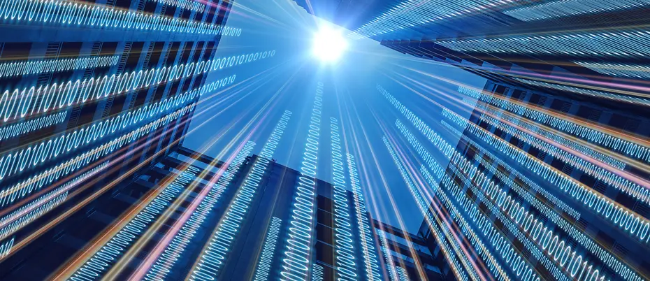 Binary code running up skyscrapers