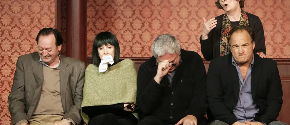 4 people sitting together arguing