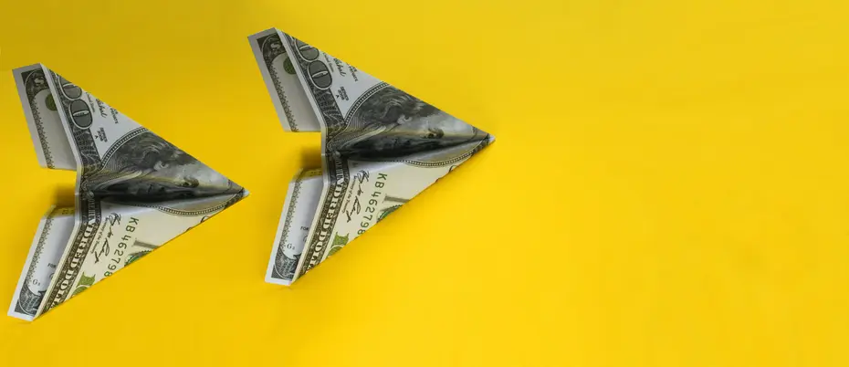 $100 dollar bills made into paper airplanes