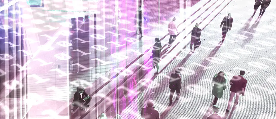 Silhouettes of people walking though binary code 