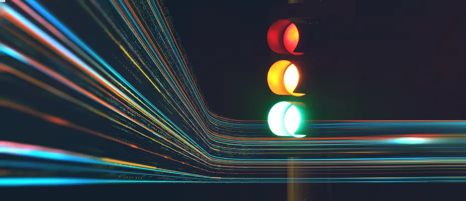 A traffic light with abstract data lines running through it
