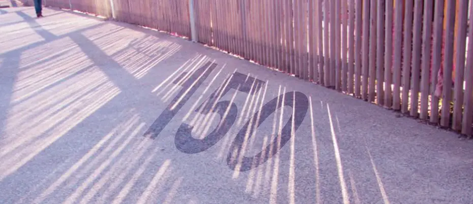The number "150" appears in a fence's shadow