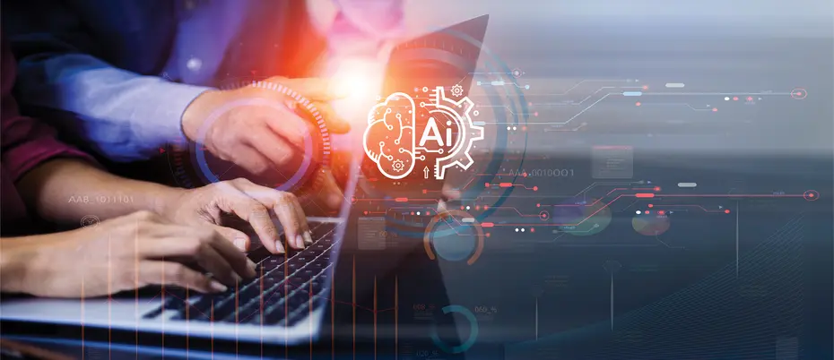 Two people looking at a laptop with the words "Ai" showing